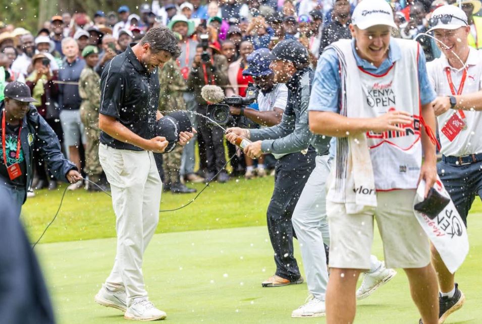 Casey Jarvis (L) celebrates winning the magical Kenya Open 