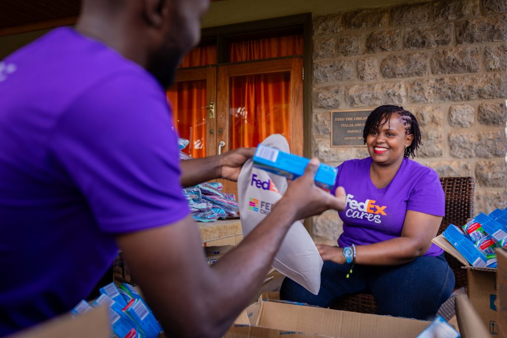 FedEx colleagues prepare hygiene kits for children and families in need.